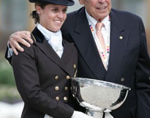 Julie de Deken wins the Aachen Under 25 Competition and receives the trophy from its sponsor Klaus Rheinberger, widower of Liselotte Linsenhoff whose horse Piaff  was used to name the Piaff Forderpreis in Germany