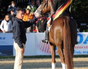 Eva Möller and Blickpunkt win the 6-year old Dressage Horse Division at the 2010 Bundeschampionate. Husband Ulf holding the horse :: Photo (c) Barbara Schnell
