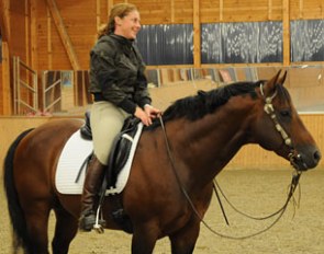 Emma Hindle enjoying Andrea Gembe's AQHA reining stallion Big Time Rooster