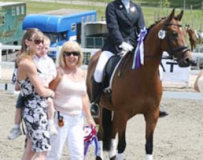 Lucy Pincus and Sheepcote Sandmartin receive their prize from show organiser Gloria Leverett and cancer survivor, 4 year old Tommy :: Photo © Simon Battram