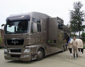 Edward Gal and Totilas pose in front of their brand new lorry