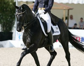 Julia Funke, daughter of major show organiser Kaspar Funke, on Heinrich Klatte's Hanoverian stallion Dr. Doolittle (by Donnerhall x Lauries Crusador xx)