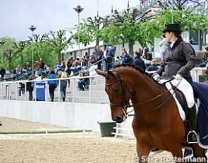 The Mannheim show ring. Isabell Werth and Don Johnson before the award ceremony