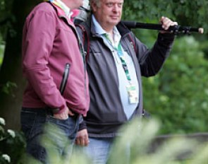 Johan Rockx and Dirk Caremans chatting before the Prix St Georges class began