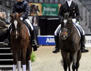 Nadine Capellmann schooling Girasol (by Gribaldi), the horse which has been called the "German answer to Totilas". Edward Gal and Sisther de Jeu passing by