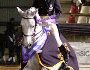 Claire Seidl and HRH winning the 2010 CDI Sydney