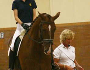 Dressage trainer Marianne Essees Söderberg from Strömsholm working on the position of the rider