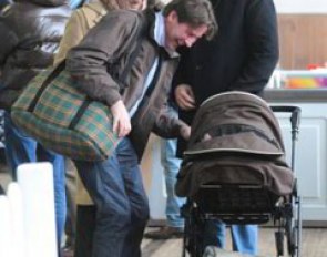 Three Men and a Baby: Fran Goodsell and Michael Ripploh looking at Michael Klimke's baby