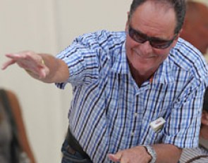 Andreas' father Ulf Helgstrand (president of the Danish Equestrian Federation) waves to a friend