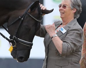 Judge Jennie Loriston-Clarke gives champion Astrix an ear rub