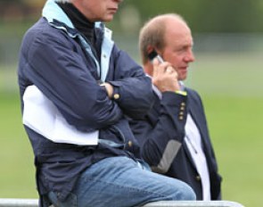 Sarkozy's owner Paul Schockemöhle and his right hand Joseph "Klaphi" Klaphake watch the warm up