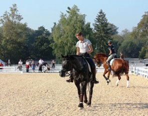 Edward Gal and Adelinde Cornelissen school their horses at the Kentucky Horse Park :: Photo © Imke Schellekens