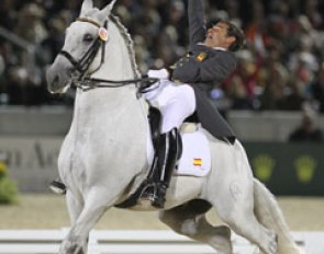 Juan Manuael Munoz Diaz cheers so hard that his horse spooks and he almost falls off