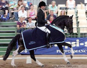 Jason James and the Friesian x Pony cross Niconero win the 4-year old pony division at 2010 Dressage with the Stars in Werribee, Australia :: Photo © Berni Saunders