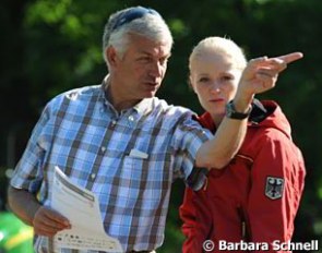 Ton de ridder explaining something to his daughter, junior rider Jill de Ridder