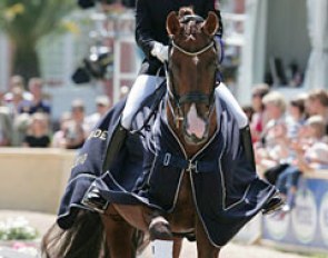 Charlott Maria Schurmann won the Junior Riders Team Test at the 2010 CDI Wiesbaden. She rode the prize giving ceremony on her second horse Burlington (by Breitling)