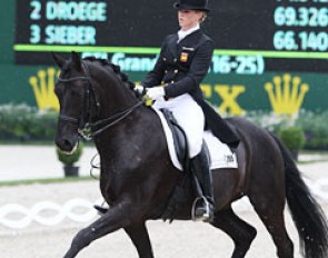 Morgan Barbançon and Painted Black with the 2011 CDIO Aachen score board in the background :: Photo © Astrid Appels