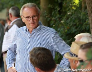 Trainer Jurgen Koschel has a chat