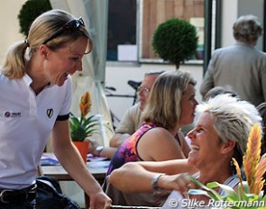 Having fun at the 2011 Bundeschampionate. Helen Langehanenberg and Uta Gräf share a laugh :: Photo © Silke Rottermann