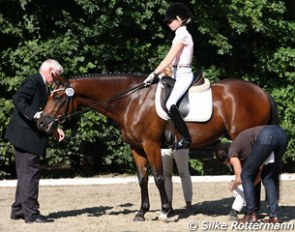 The FEI stewards does a check up on this pony combination