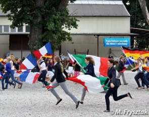 The kids running round at the opening ceremony