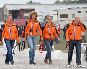 The handlers of the Dutch ponies during the medal ceremony