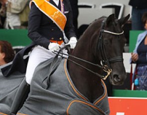 Adelinde Cornelissen on another horse for the prize giving ceremony and victory lap.