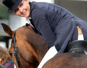 Vivien Niemann looks at the score board to check out her winning mark