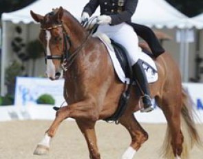 Isabell Werth on Bella Rose (by Belissimo M x Cacir AA)