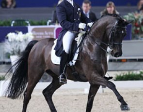 Belgian Jeroen Devroe and Apollo van het Vijverhof were well on their way to score 72% but at the end of the canter tour, the dark bay gelding spooked in the corner at K and the score dropped to 69.787%. Pity