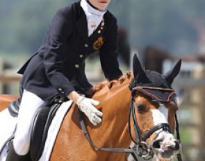 Celine Brauns finishes her ride on Neervelds Blamoer