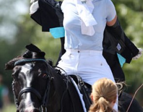 Dominique Tardin and Danzas finished their ride by shaking off coat and sweat