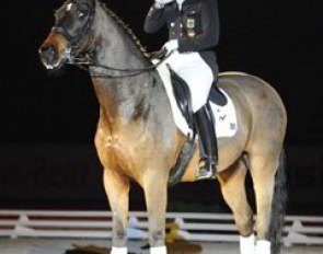 Isabell Werth in tears during Satchmo's retirement ceremony at the 2011 CDI Stuttgart :: Photo © Barbara Schnell