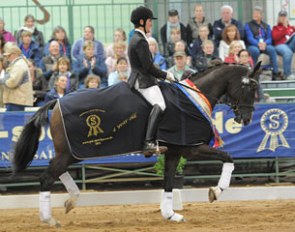 John Thompson on Hollands Bend Santara, winners of the 4-year old material championship