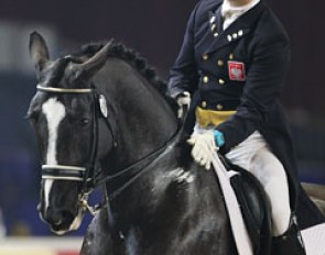 Polish Michal Rapcewicz gives S Rappe (by Ronaldo x Balzflug) a pat after well executed one tempi's