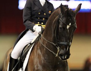 Lana Slier on Danielle van Mierlo's black Dutch bred gelding Reggea (by Kennedy)