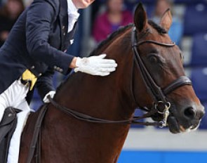 Lyndal Oatley gives Sandro Boy a big pat at the 2012 CDIO Aachen :: Photo © Astrid Appels