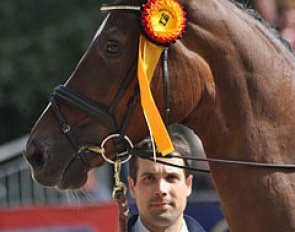 Helen's husband Sebastian Heinze holding Damon's Delorange