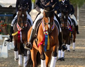Jan Ebeling leads the victory lap at the 2012 CDI-W Burbank flanked by Yvonne Losos de Muniz and Steffen Peters :: Photo © Sheryl Ross