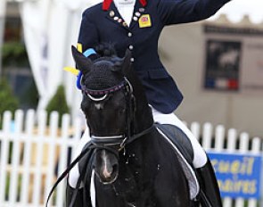 British pony rider Maisie Scruton waves to the crowds