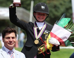 Judge at C for the kur Raphael Saleh with gold medal winning Semmieke Rothenberger