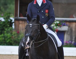 Carl Hester finishes his ride on Uthopia