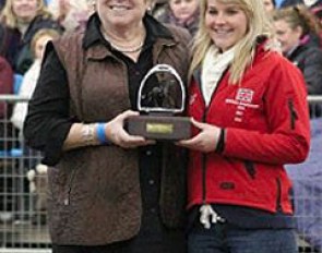 Desi Dillingham handing an award to British Young Rider Olivia Oakeley