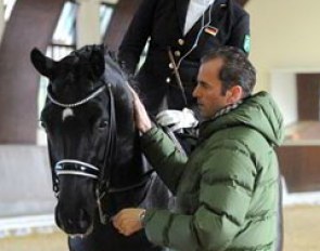 Anna Christina Abbelen on her junior riders' horse Furst on Tour with coach Heiner Schiergen on her side