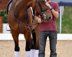 Isabell Werth's Spanish groom Guillem Barcelo with El Santo