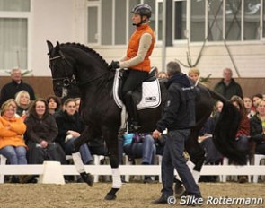 Morten Thomsen helping Ingrid Klimke on Dresden Mann with the piaffe work at the FN Training Seminar in Munster :: Photo © Silke Rottermann