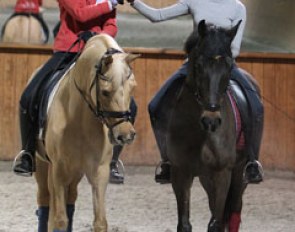 Anastasia Huet on Equestricon's Day of Diva and Lavinia Arl on Equestricon's Epiascer do a high five! :: Photo © Astrid Appels