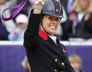 Charlotte Dujardin shows off her Olympic gold medal to the crowds :: Photo © Astrid Appels