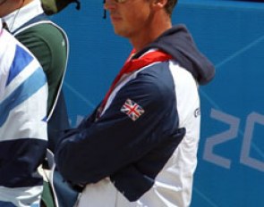 Carl Hester in full concentration, watching Charlotte's ride
