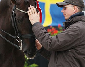 Loranne's father Ronny Livens patting Aaron